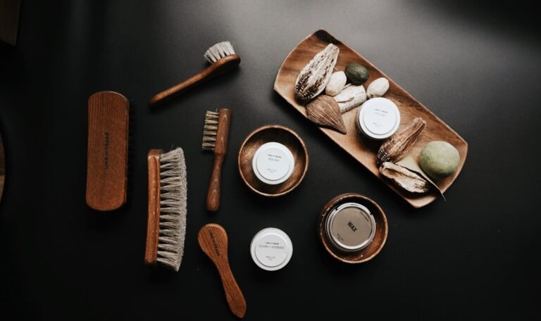 Hand brushes made of natural wood on a plate