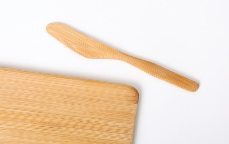 a wooden spoon on a white background
